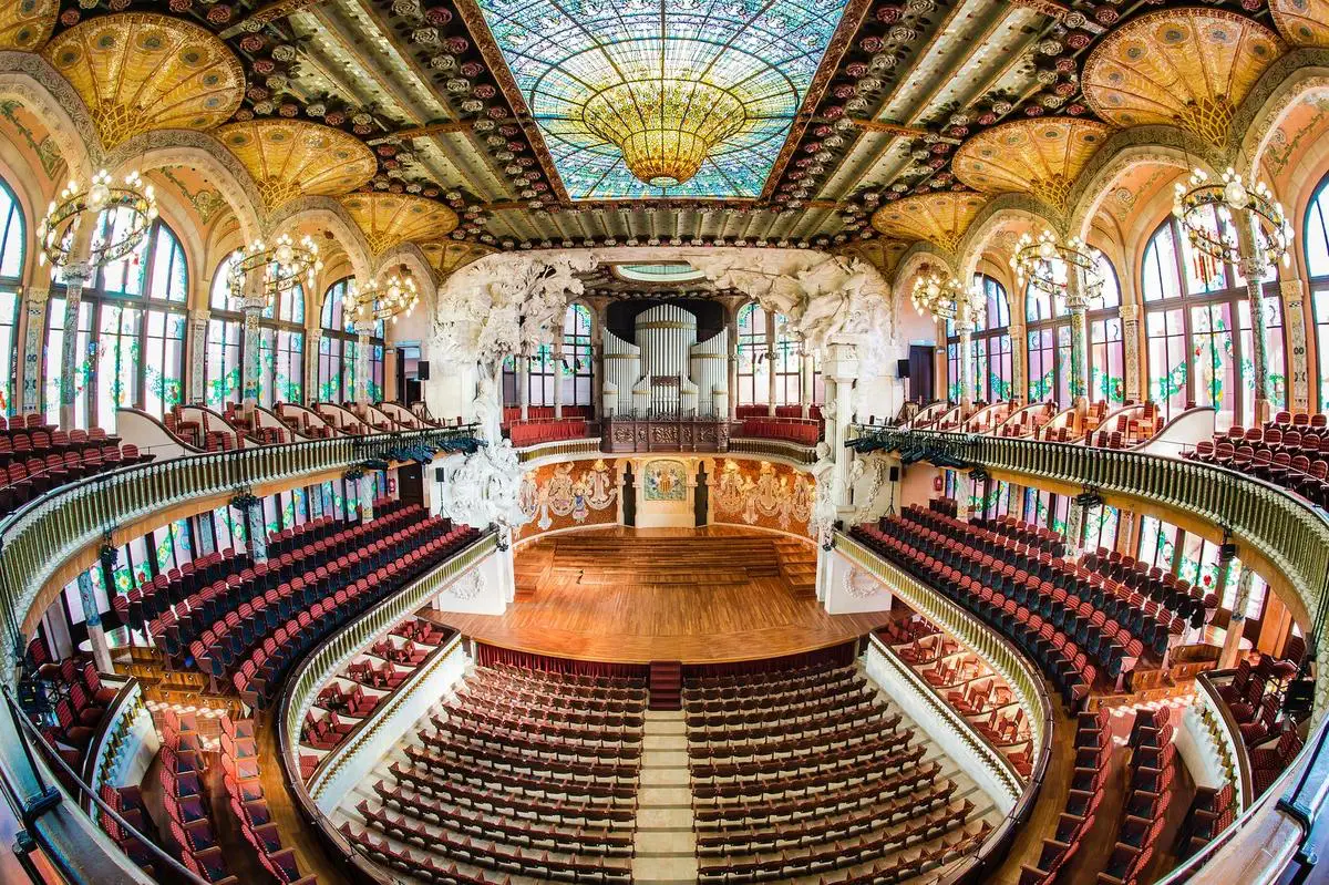Palau de la Música Catalana interior with stained glass ceiling during a guided visit in Barcelona